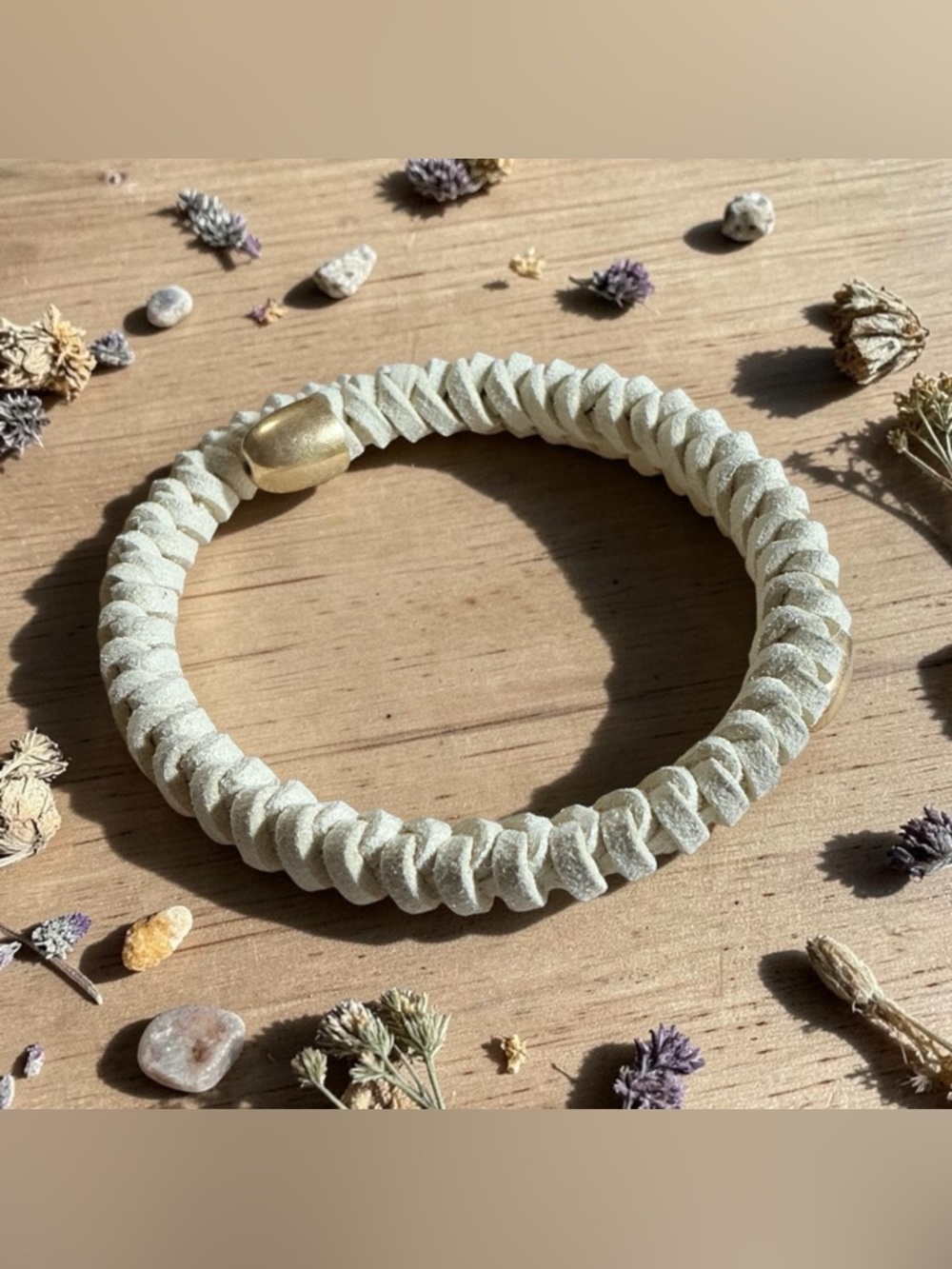 Plunder Cream Braided Leather Spring Bracelet with Gold Cap Tips